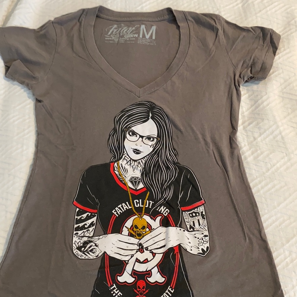Fatal crew v neck. I am size S and this one fits perfectly - they run small